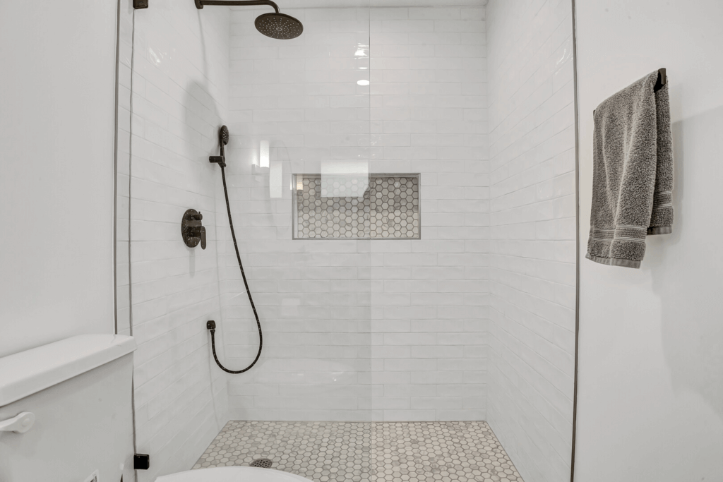 Glass walk-in shower in bathroom in Allandale in Austin, Texas