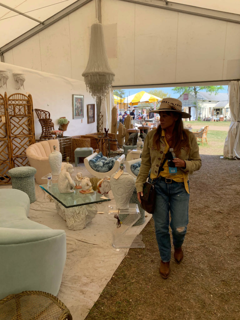 Designer Gege Cordeiro browsing the Round Top Fall Show