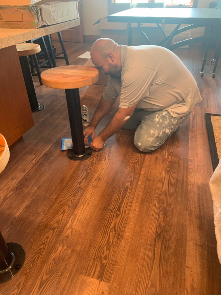 Custom bar stool installation at University of Texas Women's Golf lounge