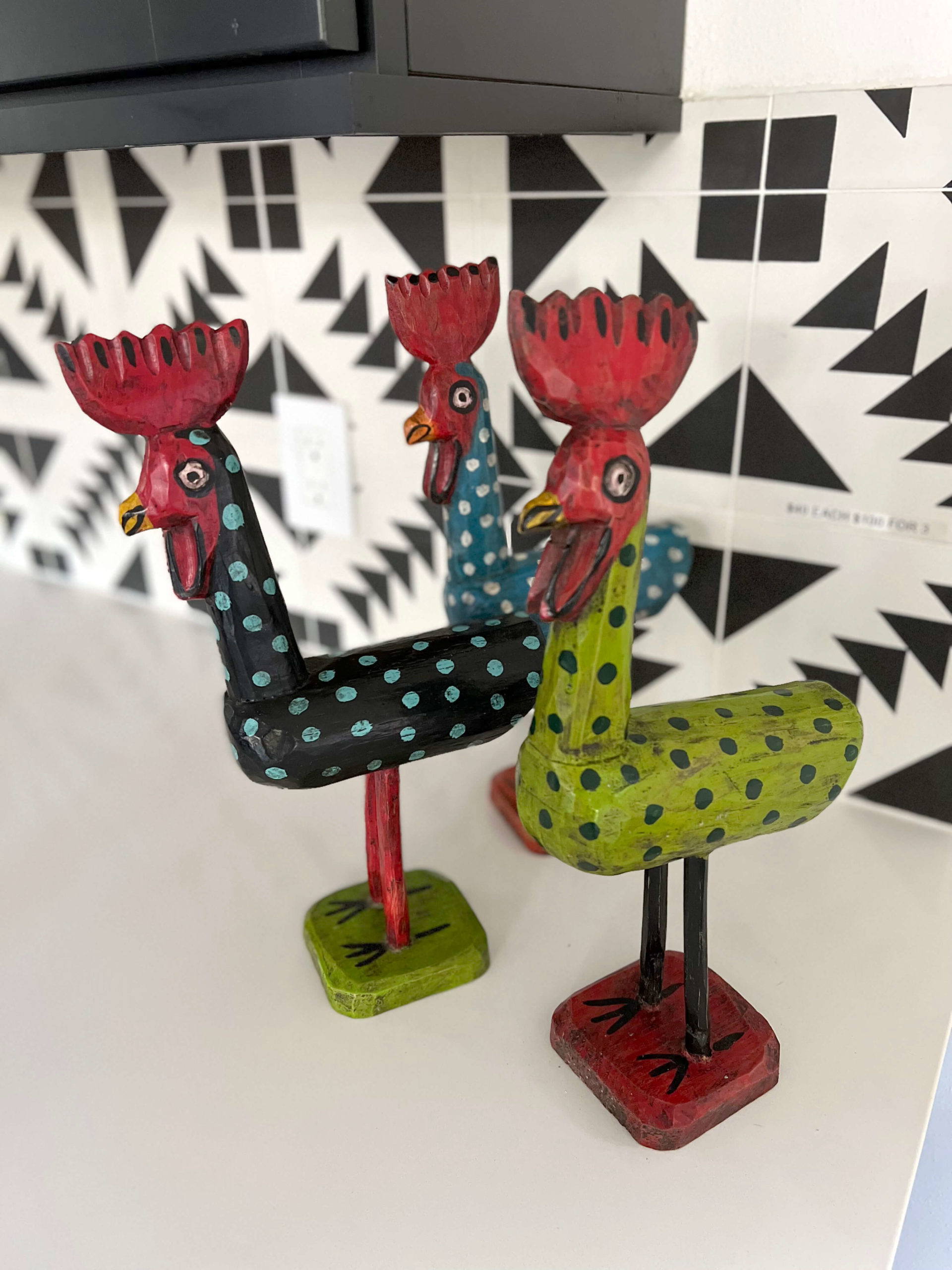 Guatemalan wooden animals in kitchen in Bouldin Creek Airbnb in South Austin, Texas