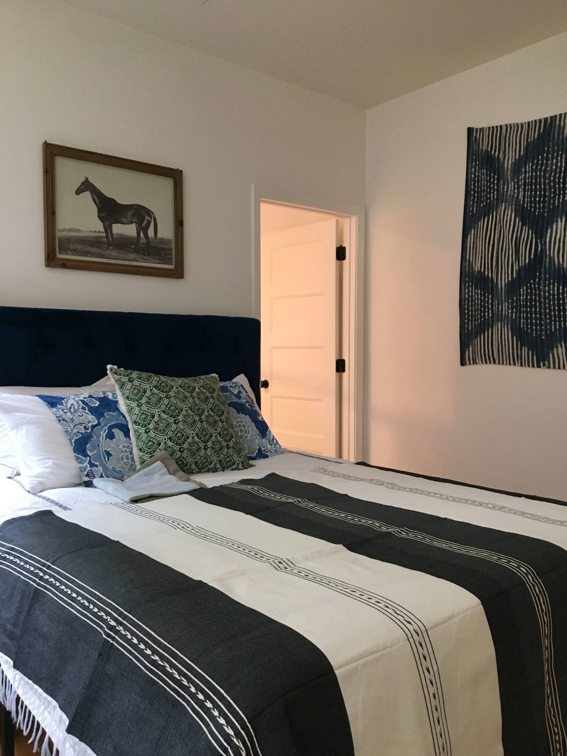 Bedroom with Mexican bedspread in Bould Creek Airbnb in Central Austin, Texas