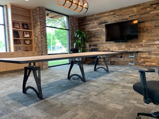 Custom vintage industrial-inspired conference table in DC Law office in North Austin